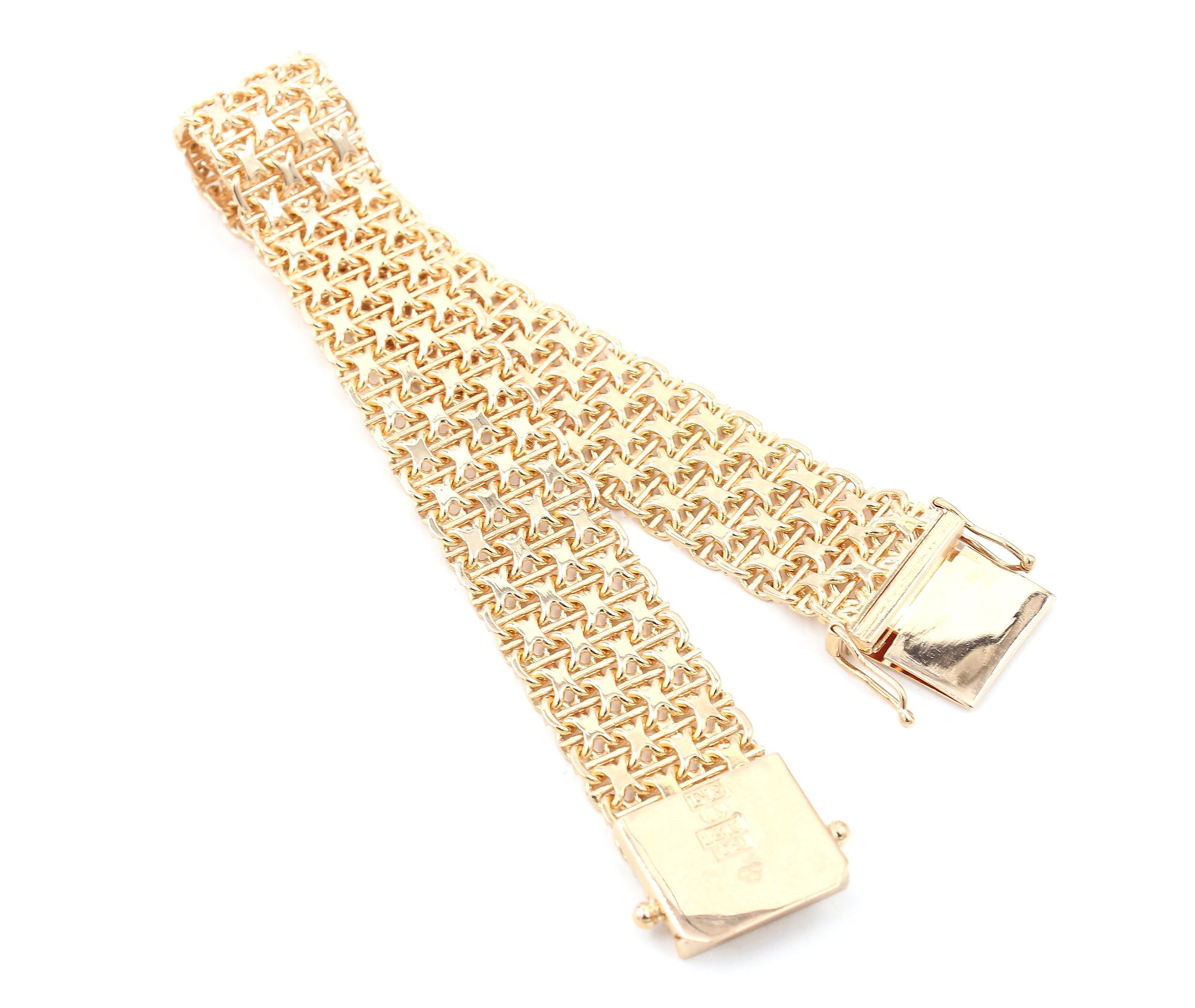 X-länk armband med stavar i 18k guld 4X . vikt:32,3