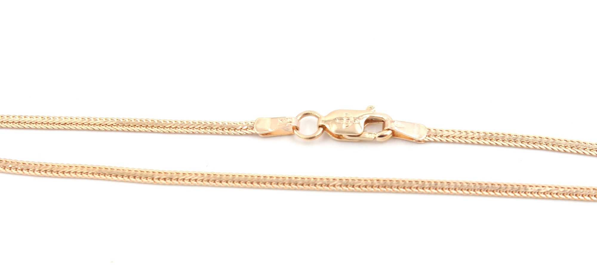 Fiskben halsband i 18k guld . vikt: 4,53 g