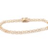 X-länk armband i 18k guld . vikt: 4,49 g