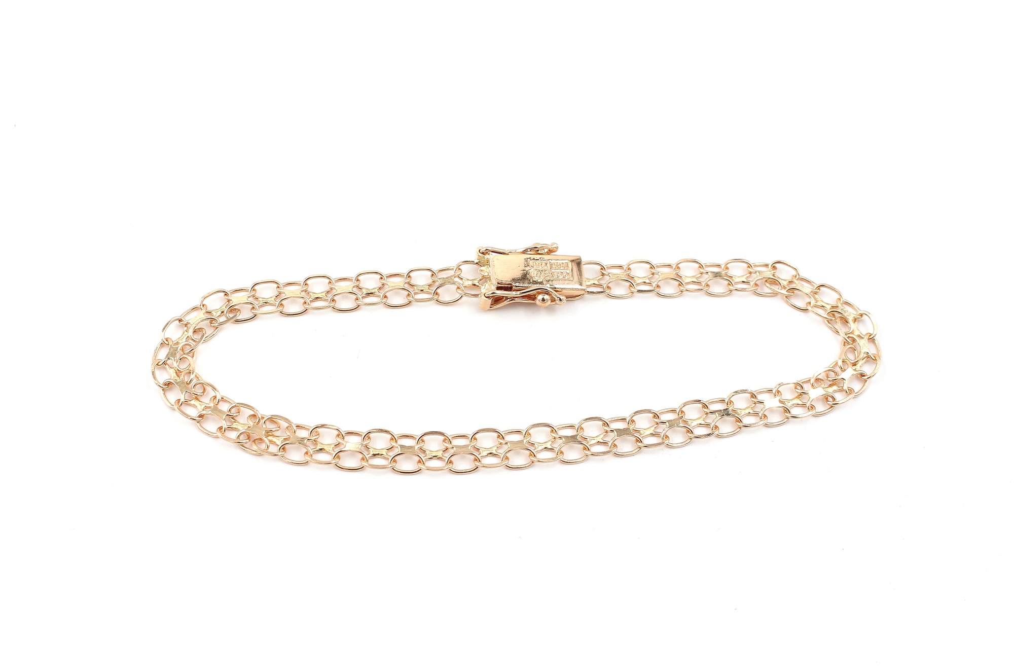 X-länk armband i 18k guld . vikt: 4,49 g