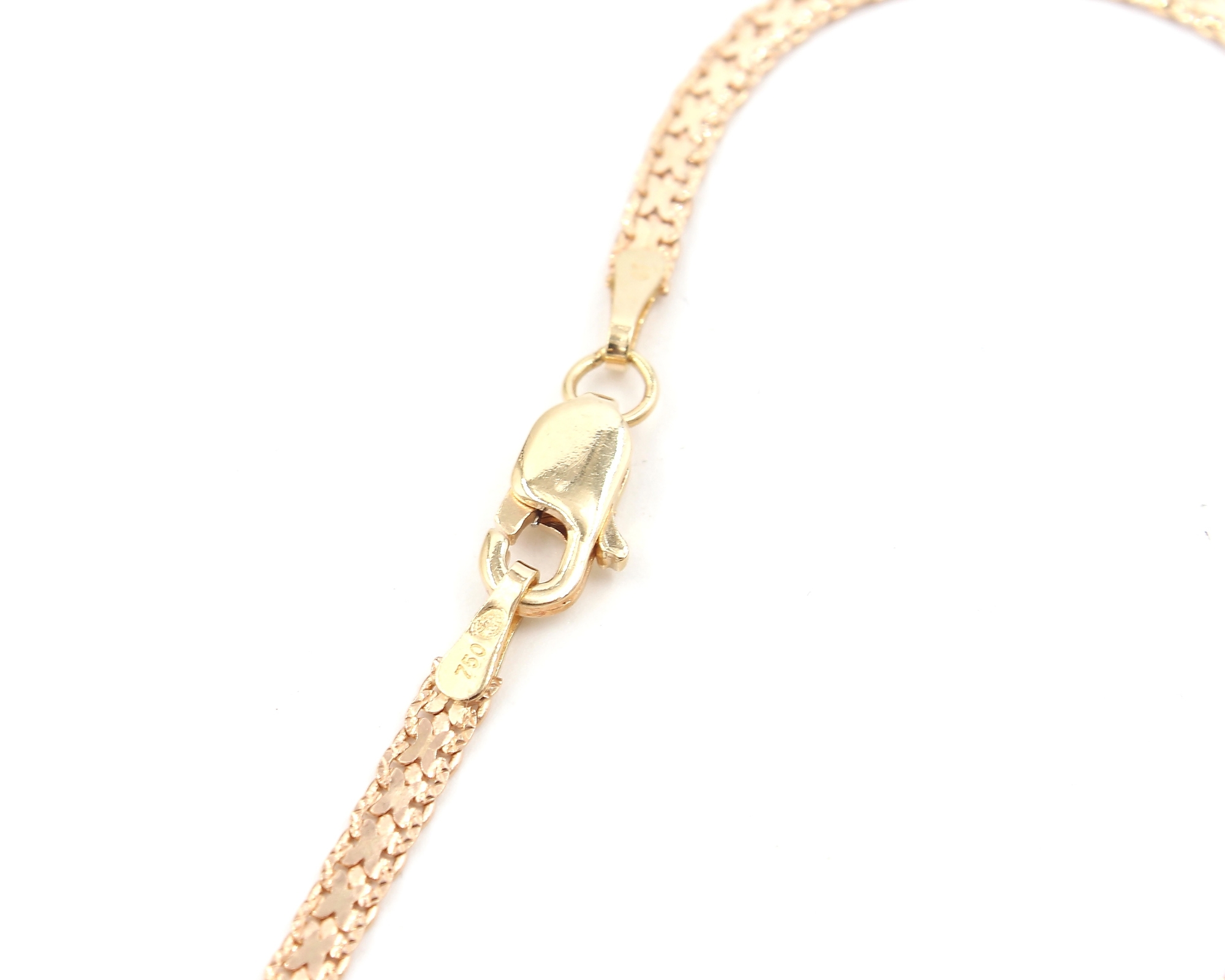 X-länk armband i 18k guld. vikt: 2,75 g