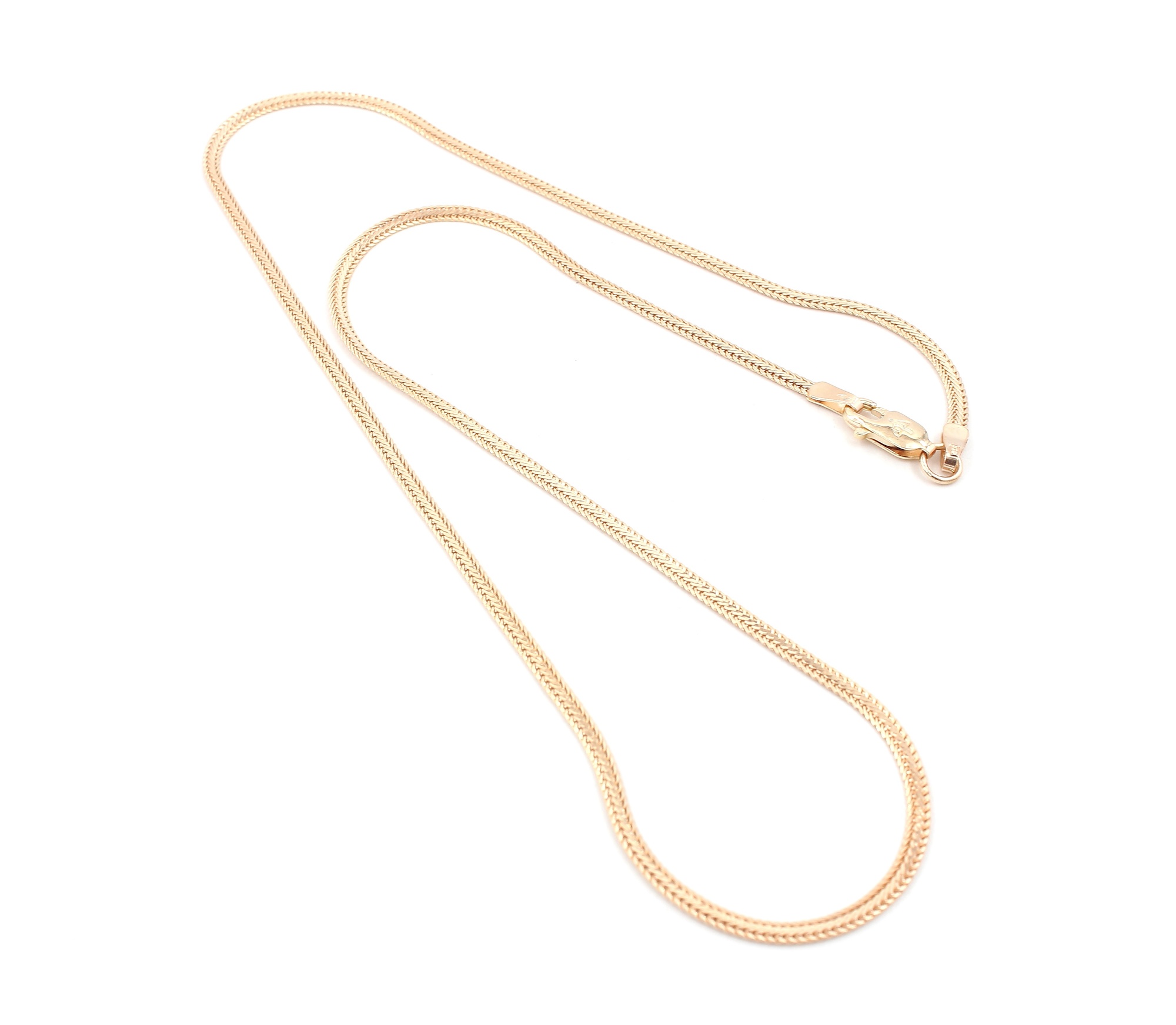 Fiskben halsband i 18k guld . vikt: 4,53 g