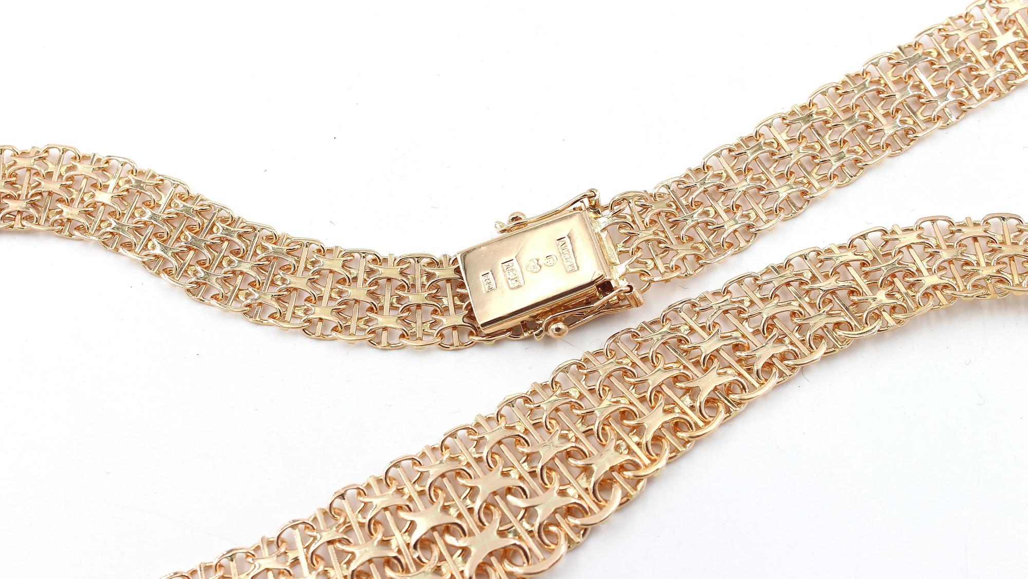X-länk halsband med stavar i 18k guld 3X. vikt: 35g