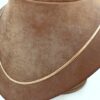Fiskben halsband i 18k guld . vikt: 4,53 g