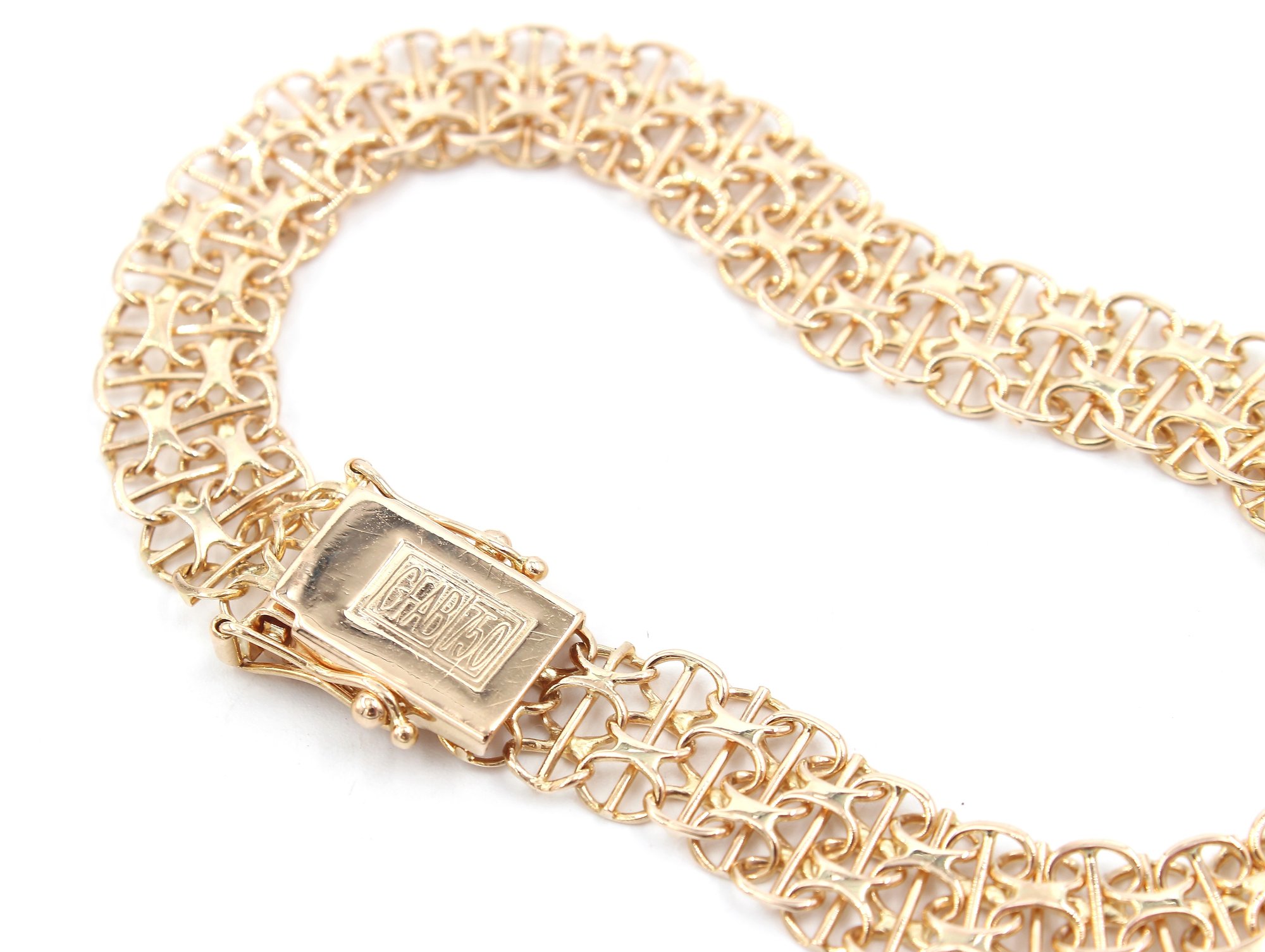 X-länk armband med stavar i 18k guld.