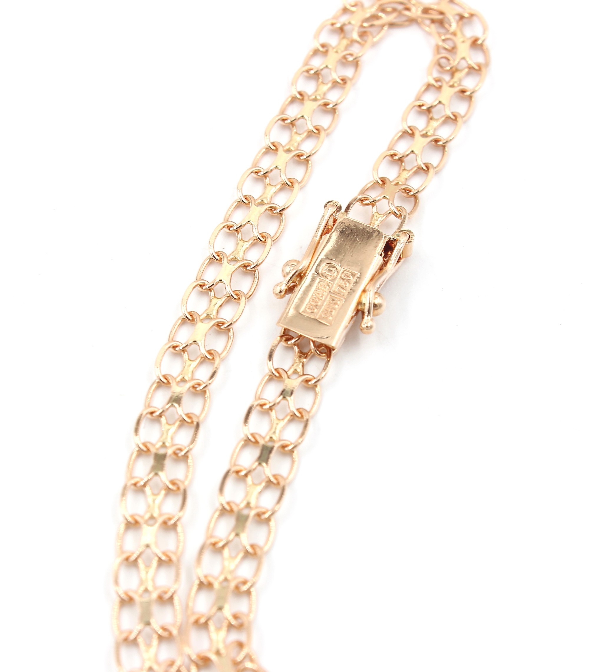 X-länk armband i 18k guld . vikt: 4,49 g