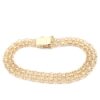 X-länk armband med stavar i 18k guld.