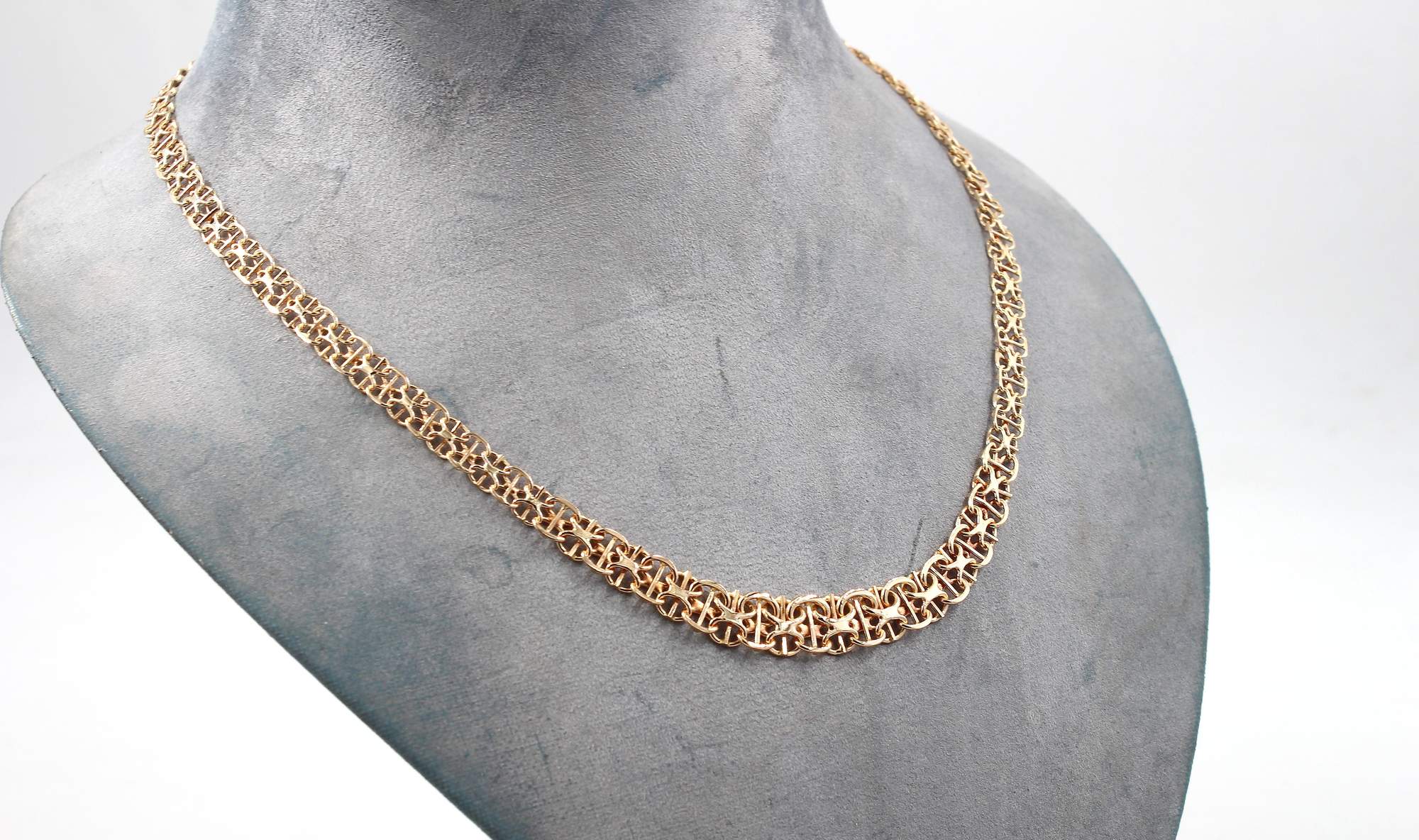 Halsband X-länk i 18k guld med stavar - doserad.Vikt 14.34