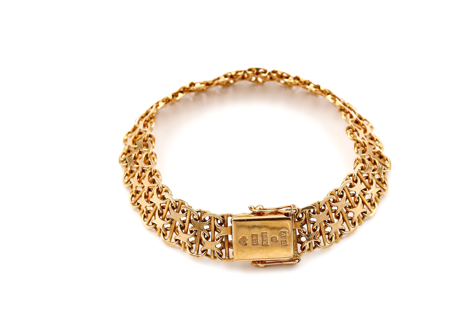 Armband x-länk i 18k guld med stavar.Vikt 19.93g