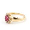 Diamantring i 18k guld med en rubin. vikt:3,65g