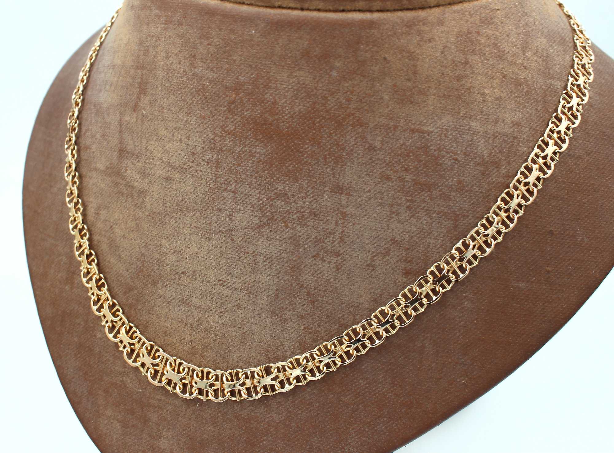 X-länk halsband med stavar i 18k guld. vikt: 15,4g