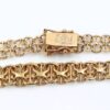 X-länk halsband med stavar i 18k guld-doserad.Vikt 15.6g