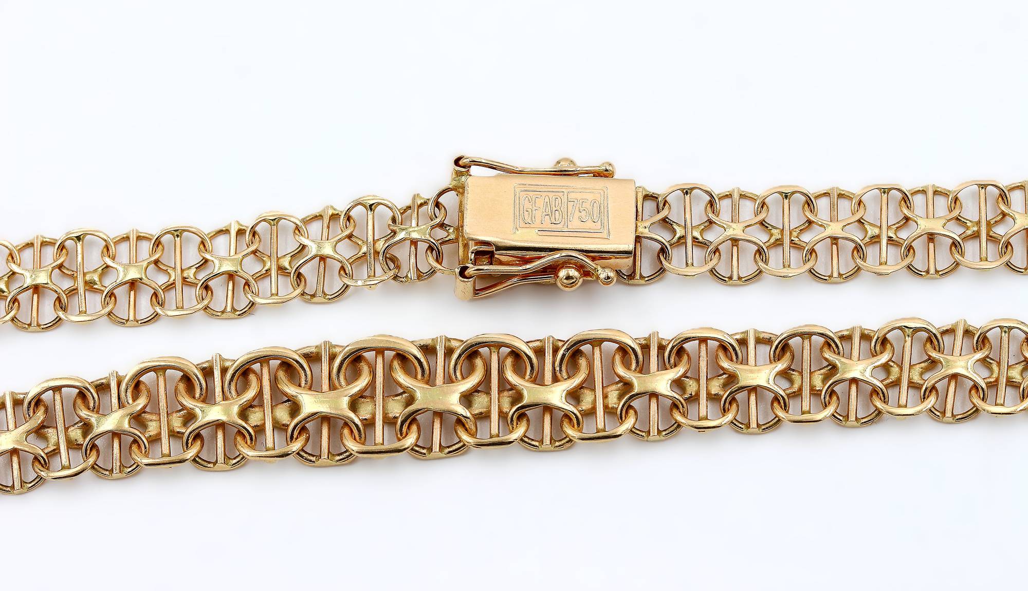 X-länk halsband med stavar i 18k guld-doserad.Vikt 15.6g