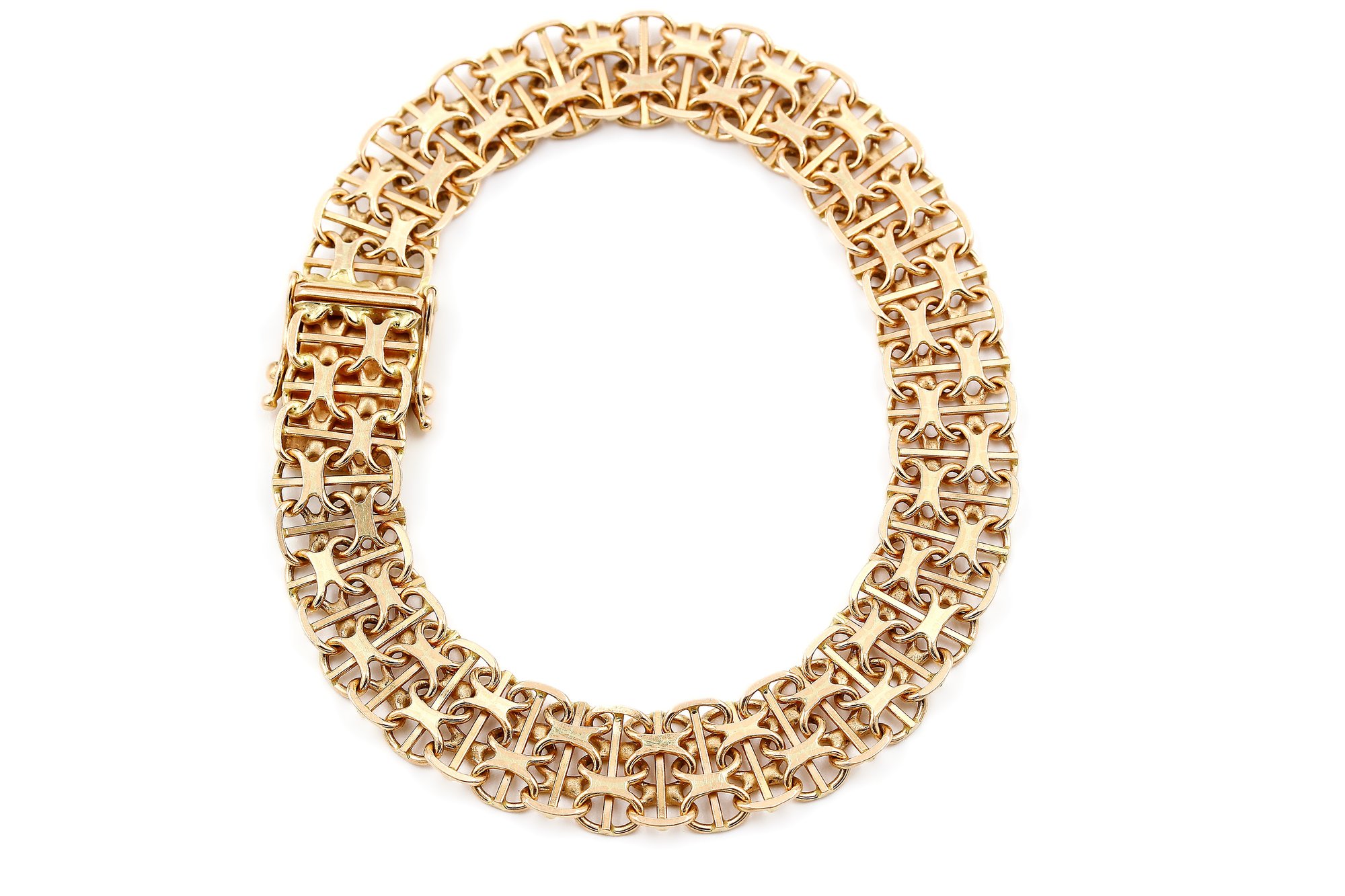 X-länk armband med stavar i 18k guld.Vikt: 14.8g