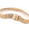 X-länk armband med stavar i 18k guld 2X. vikt: 18,3g