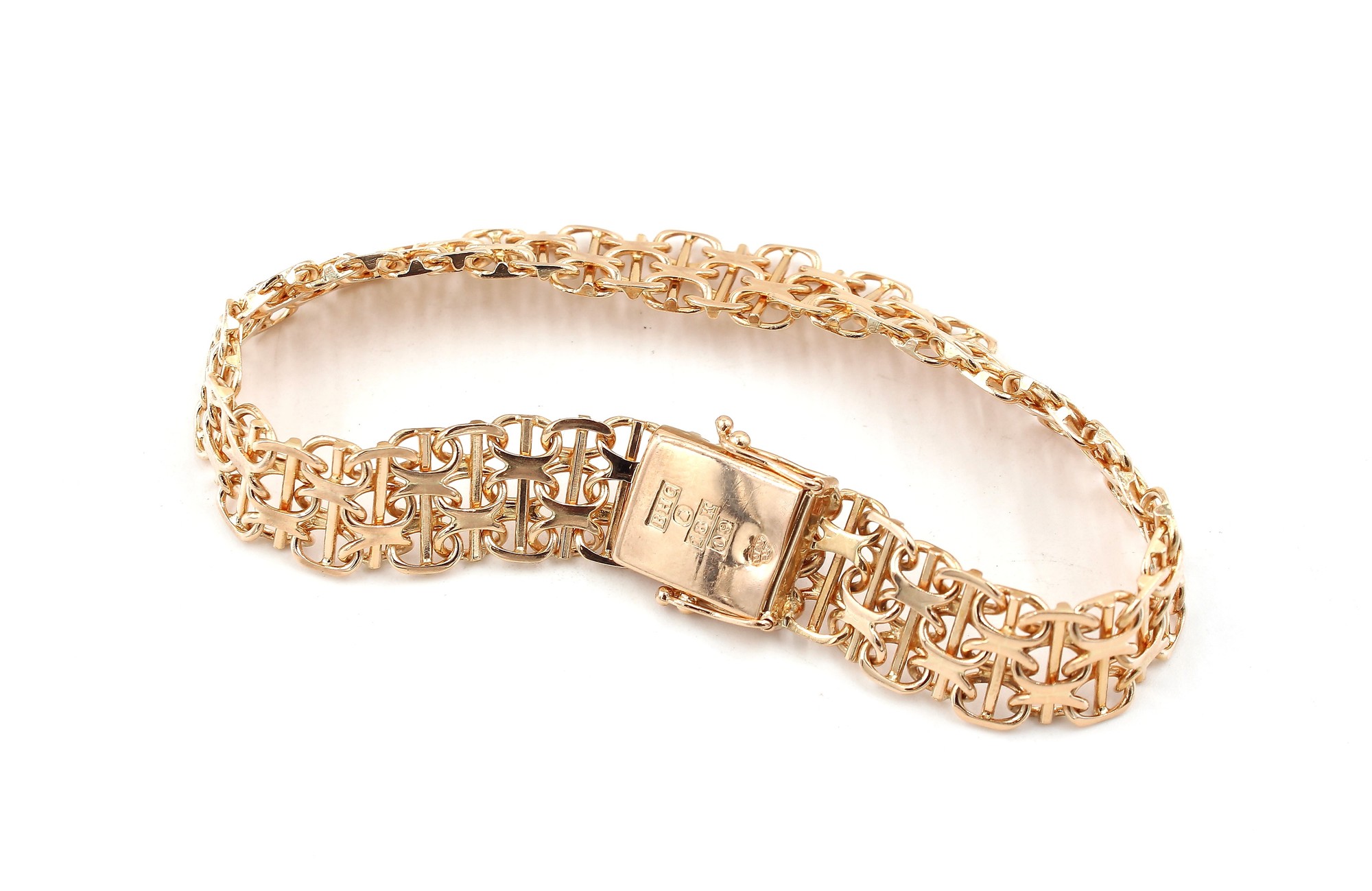 X-länk armband med stavar i 18k guld 2X. vikt: 18,3g
