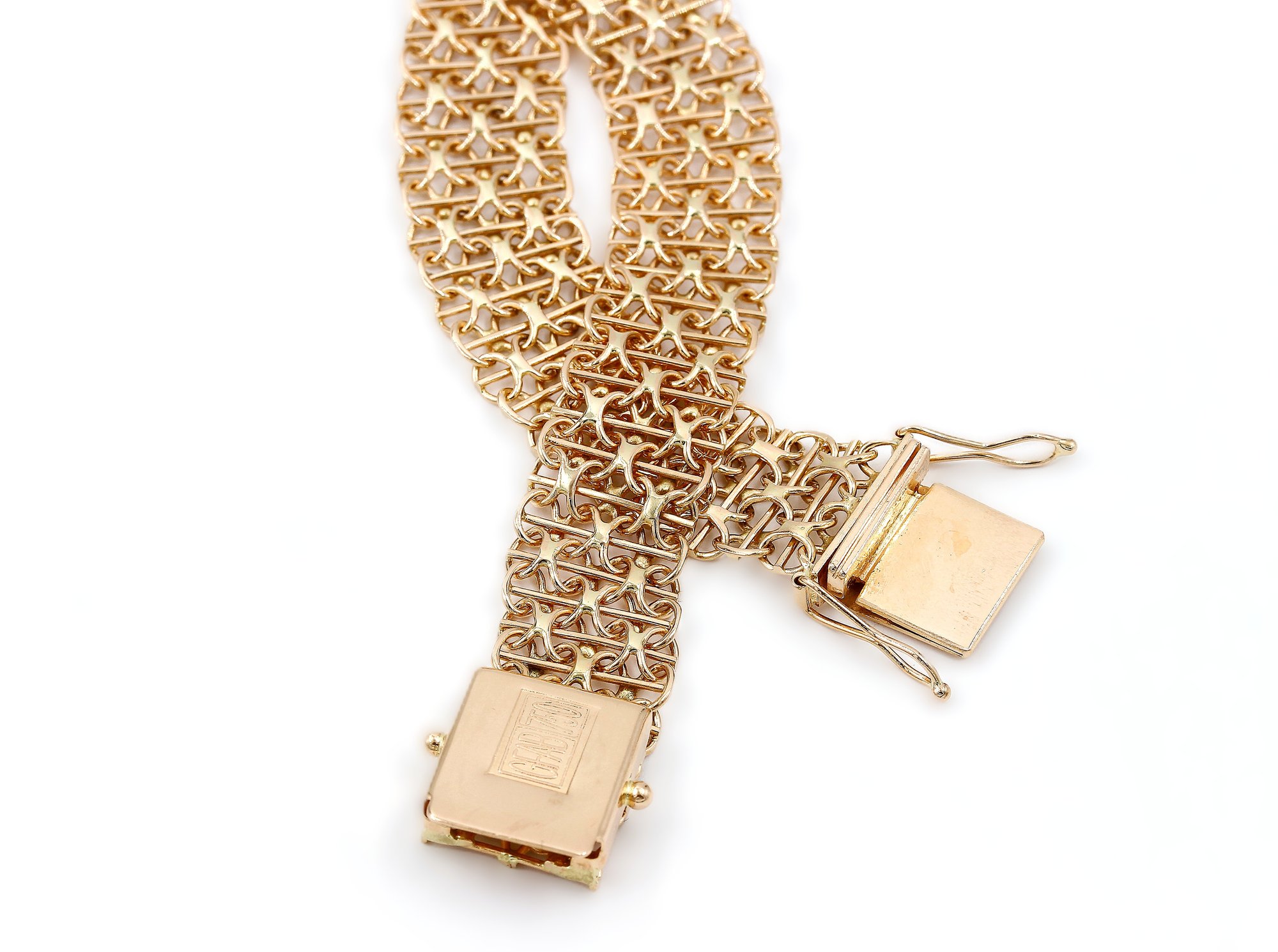 X-länk armband med stavar i 18k guld.Vikt 19.42g