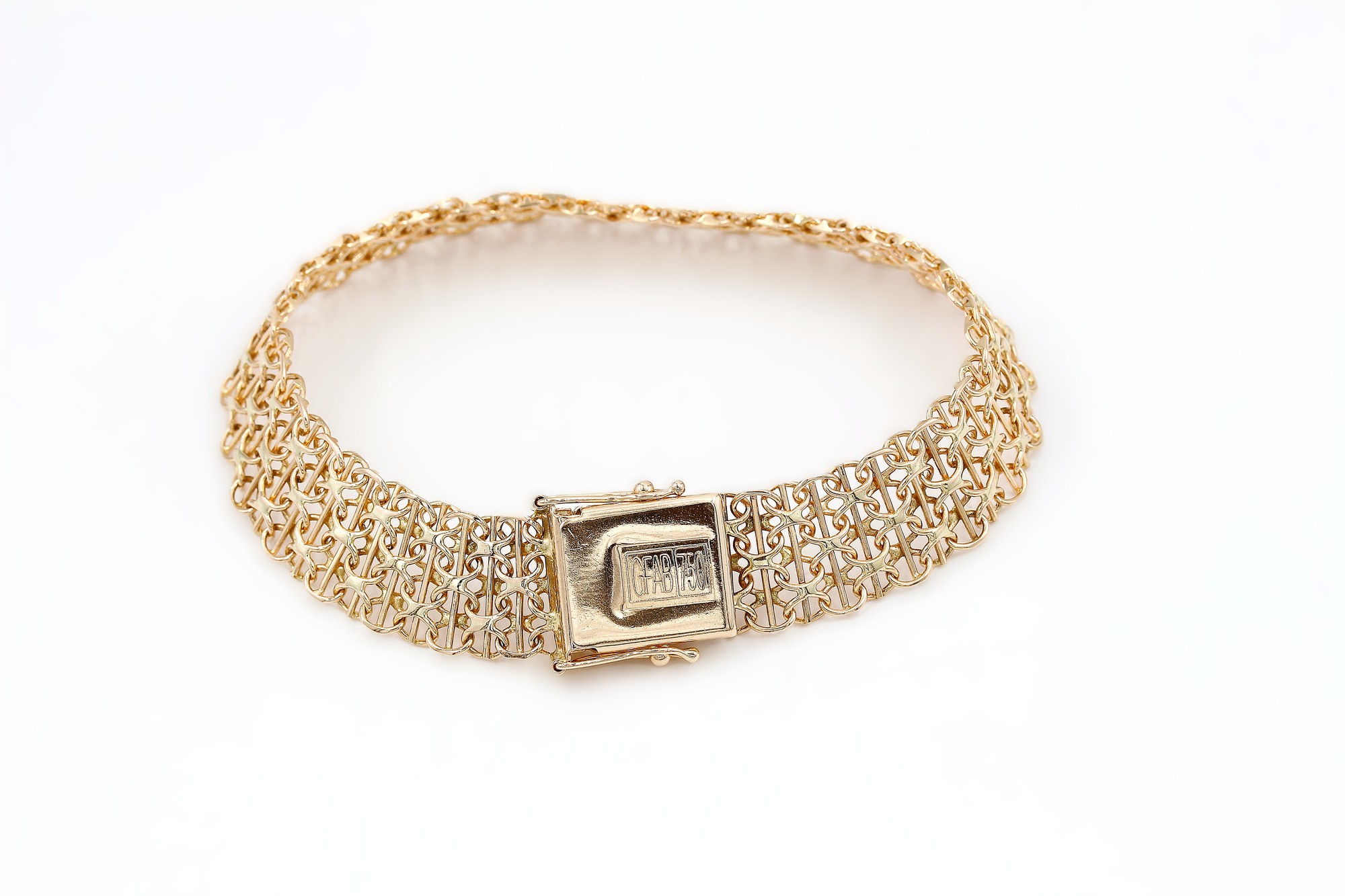 X-länk armband med stavar i 18k guld.Vikt 19.42g