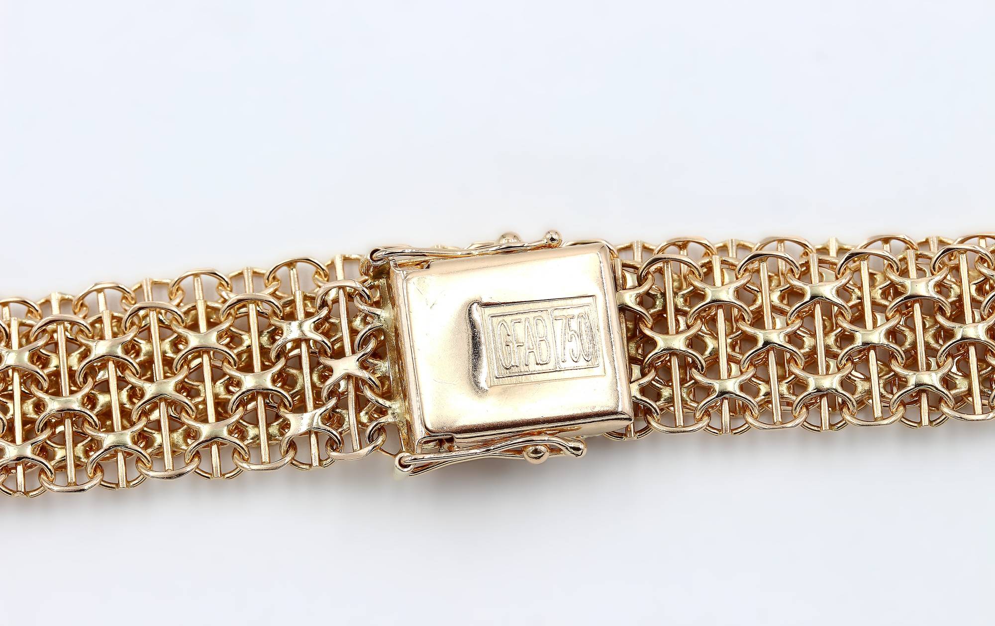 X-länk armband med stavar i 18k guld.Vikt 19.42g