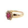 Diamantring i 18k guld med en rubin. vikt:3,65g