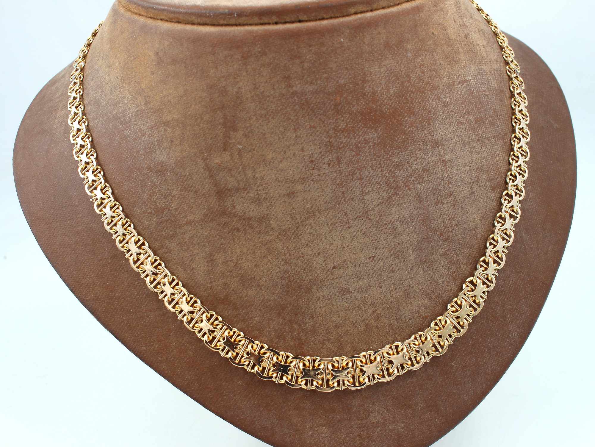 X-länk halsband med stavar i 18k guld. vikt: 25,3g