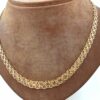 X-länk halsband med stavar i 18k guld. vikt: 25,3g