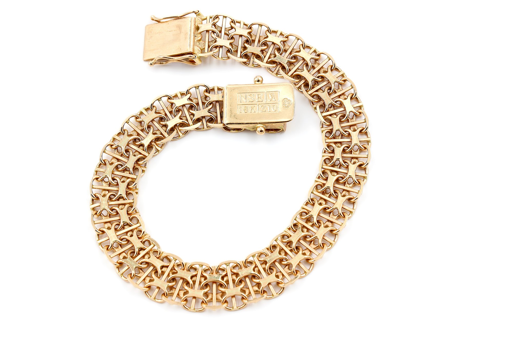 X-länk armband med stavar i 18k guld.Vikt: 14.8g