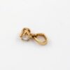 Hänge i 18k guld med en diamant på ca 0.2 ct.Vikt: 0.66g
