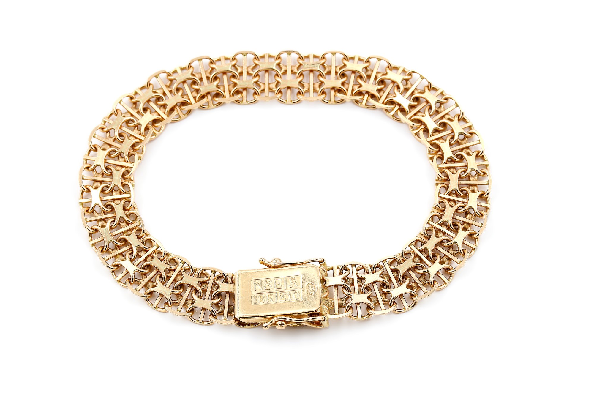 X-länk armband med stavar i 18k guld.Vikt: 14.8g