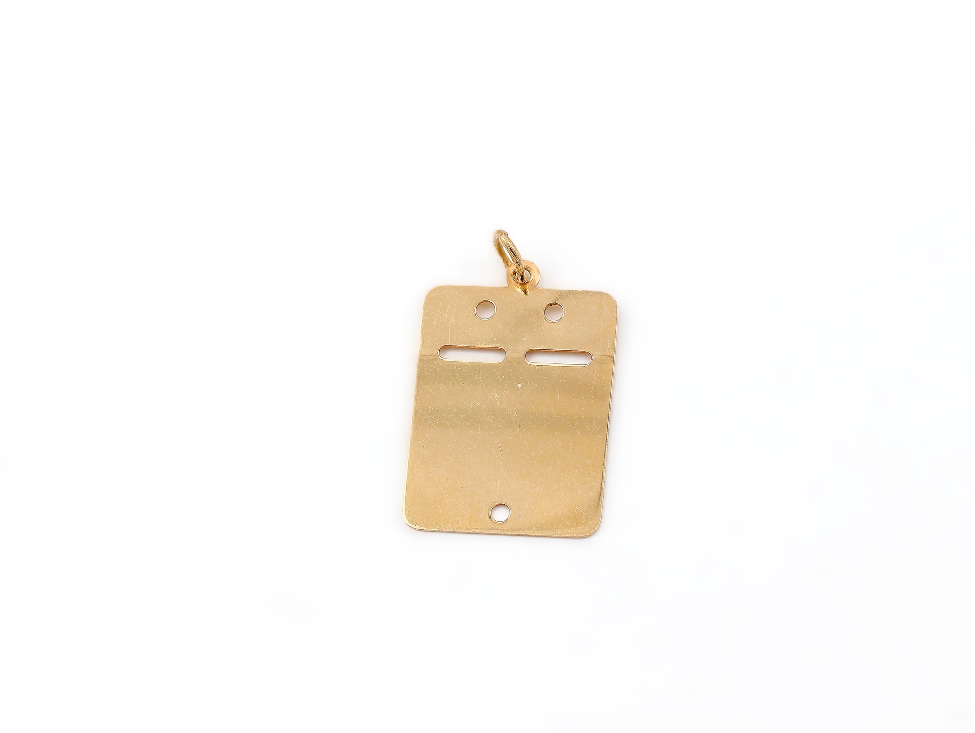 Hänge id-bricka i 18k guld.Vikt 1.5g