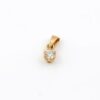 Hänge i 18k guld med en diamant på ca 0.2 ct.Vikt: 0.66g