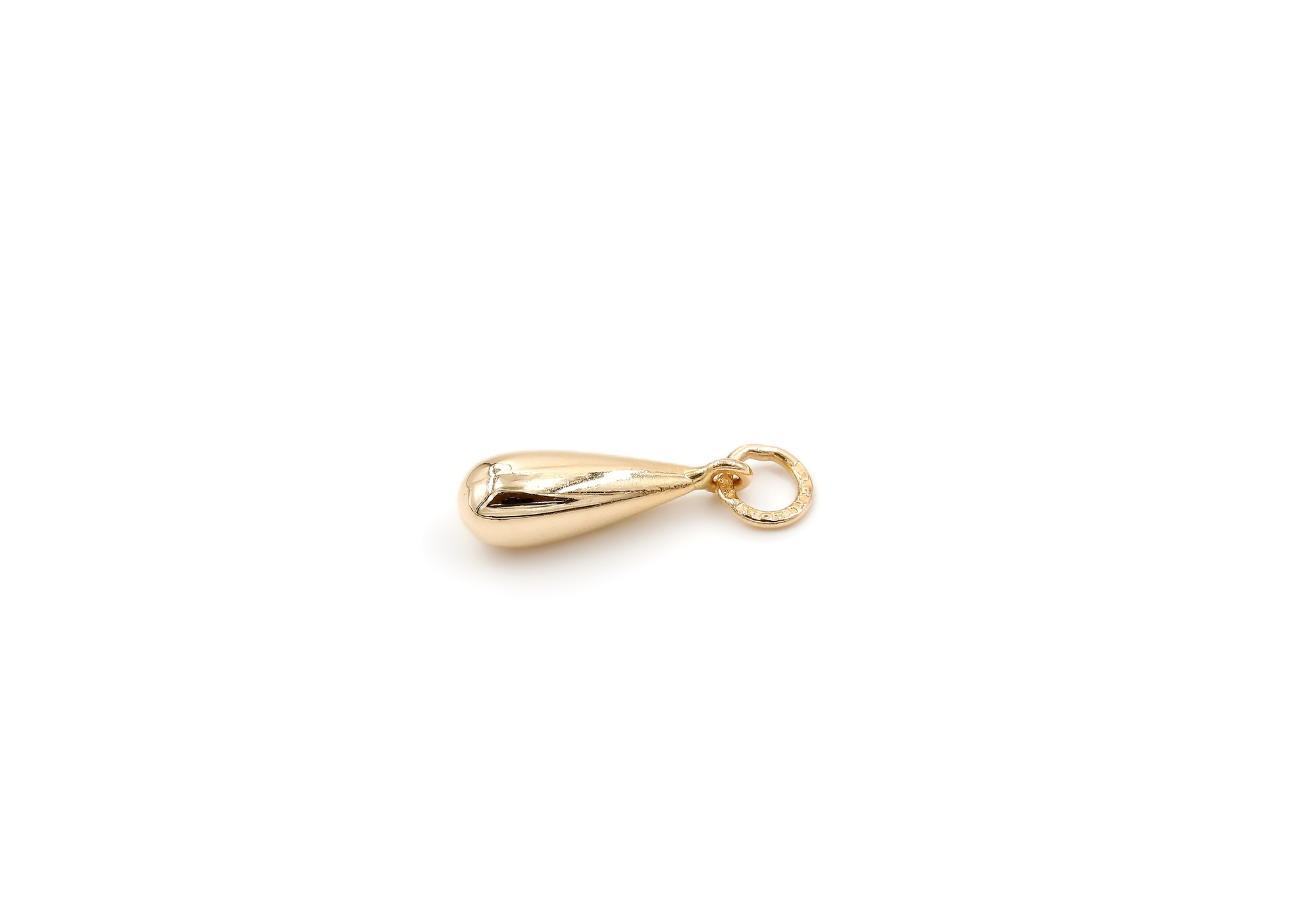 Hänge droppe i 18k guld.Vikt 0.32g