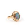 Ring i 18k guld med en opal. vikt: 3,12g