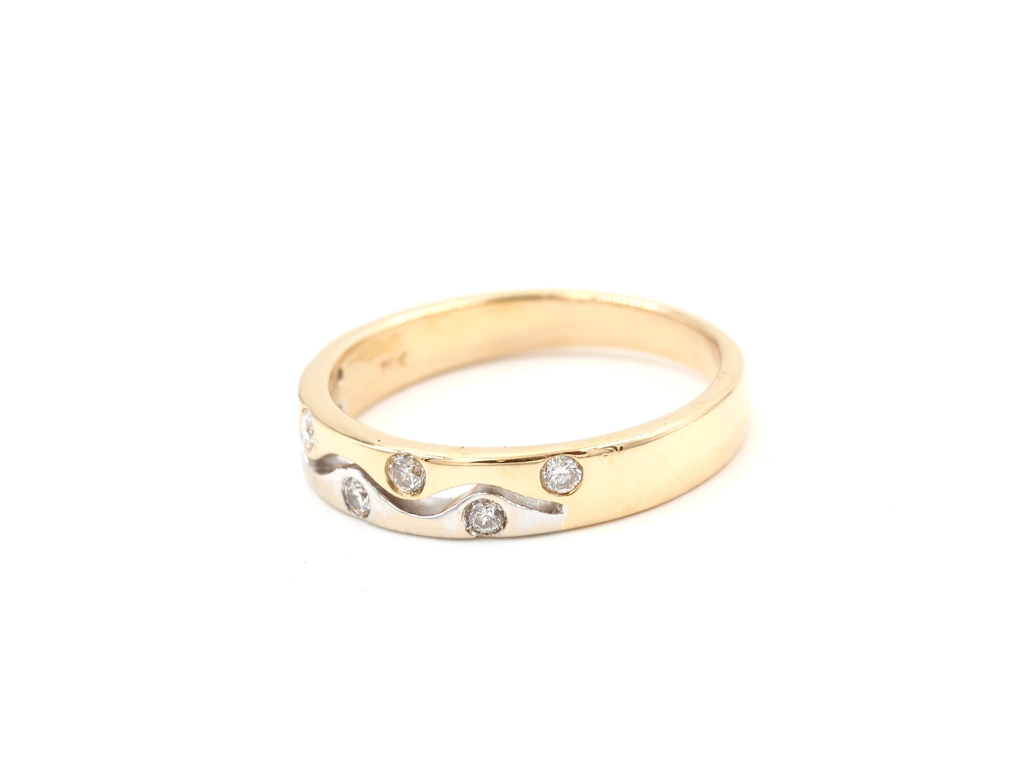 Diamantring i 18k guld och vitguld ca 0,14 ct. vikt: 4g