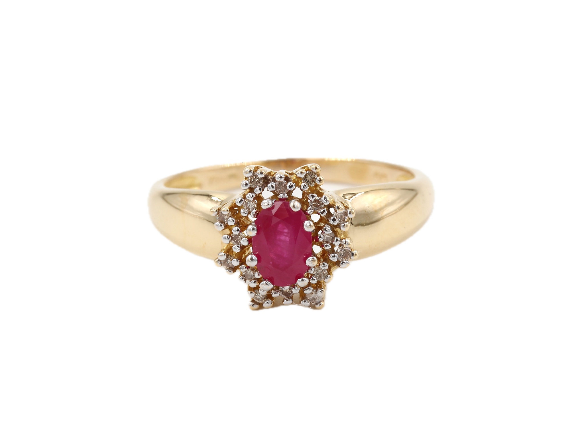 Diamantring i 18k guld med en rubin. vikt:3,65g