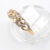 Diamantring i 18k guld med små diamanter.Vikt 2.77 g