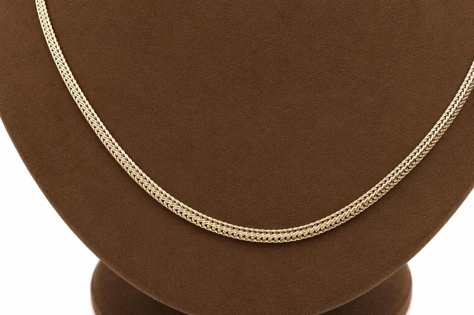 Halsband fiskben i 18k guld.Vikt 12.60 g