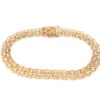 X-länk armband med stavar i 18k guld. vikt: 11,7g