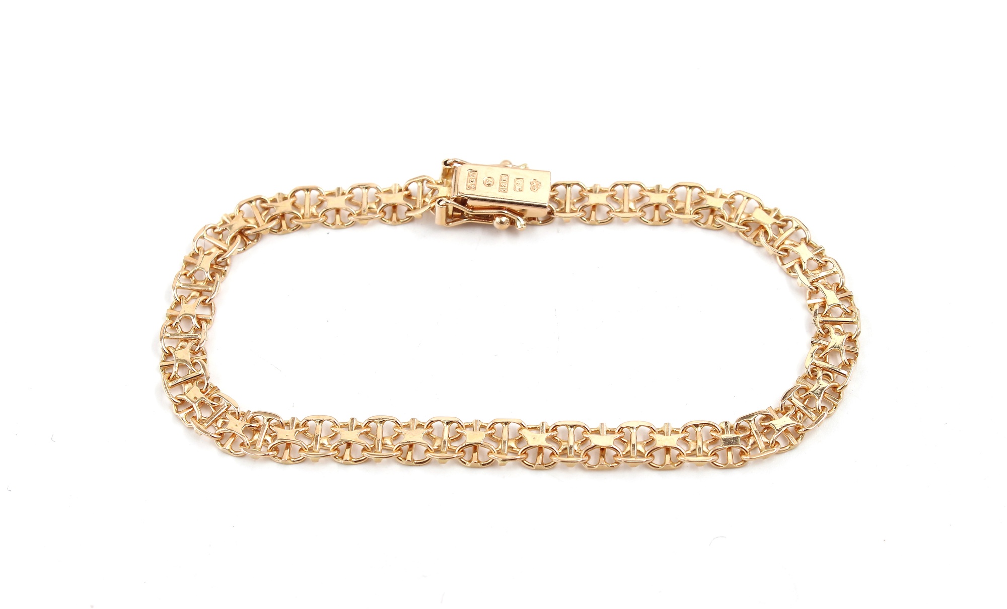 X-länk armband i 18k guld.Vikt: 7.85g