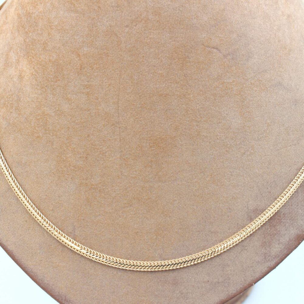Fiskben halsband i 18k guld. vikt: 8,5 g