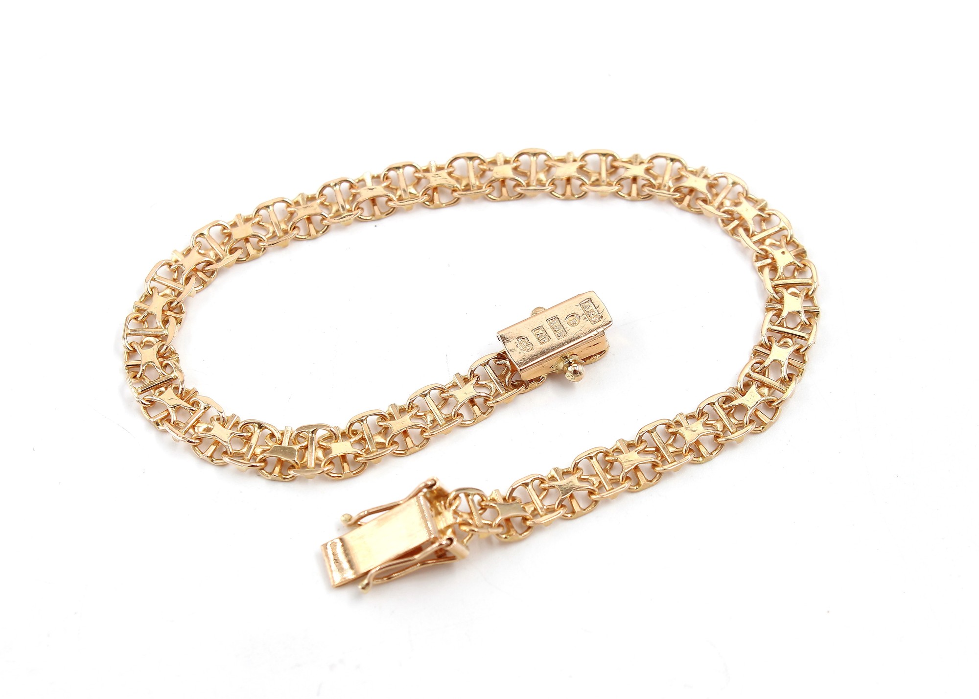 X-länk armband i 18k guld.Vikt: 7.85g