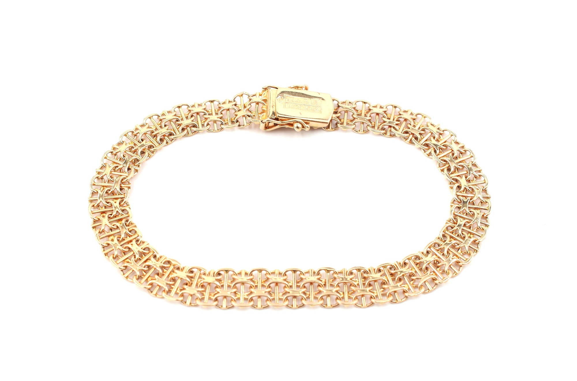 X-länk armband med stavar i 18k guld. vikt: 11,7g