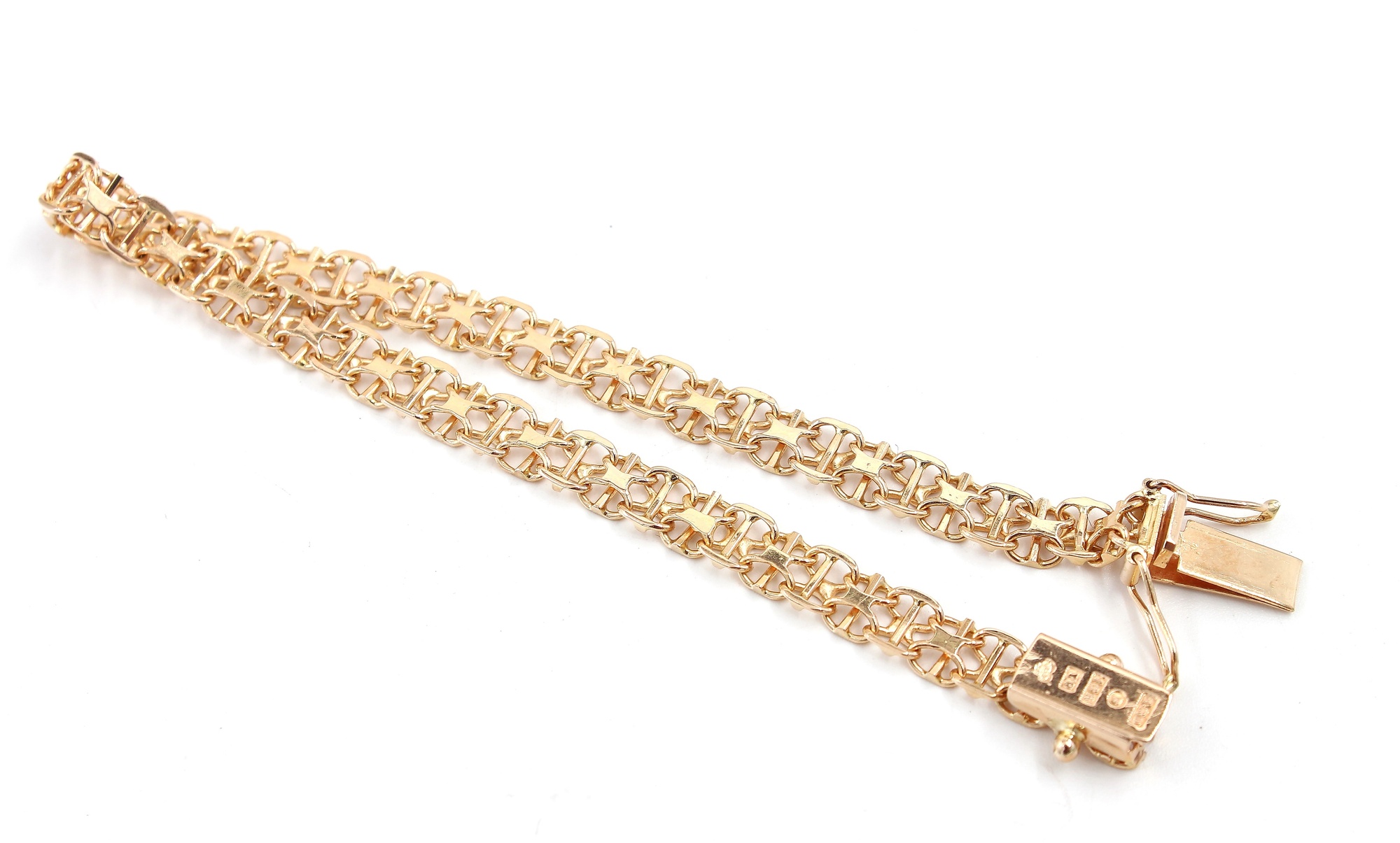 X-länk armband i 18k guld.Vikt: 7.85g