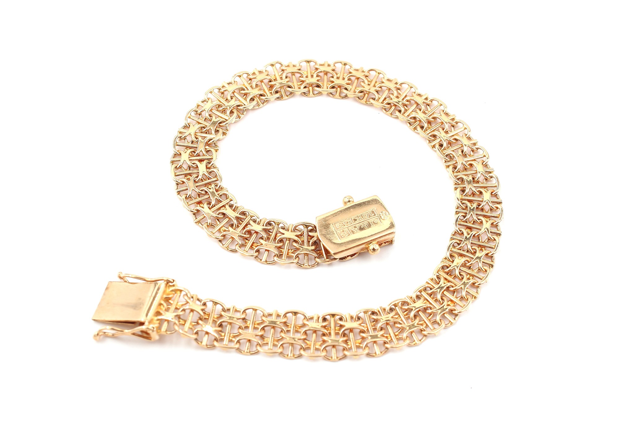 X-länk armband med stavar i 18k guld. vikt: 11,7g