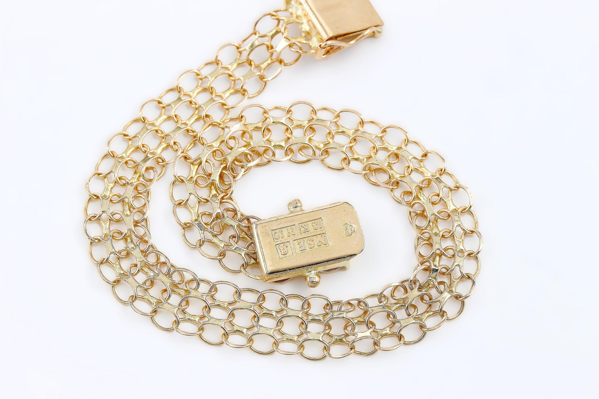 X-länk armband i 18k guld.Vikt: 7.85g