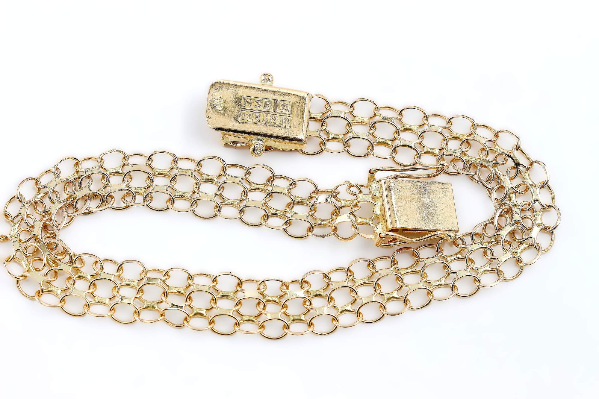 X-länk armband i 18k guld.Vikt: 7.85g