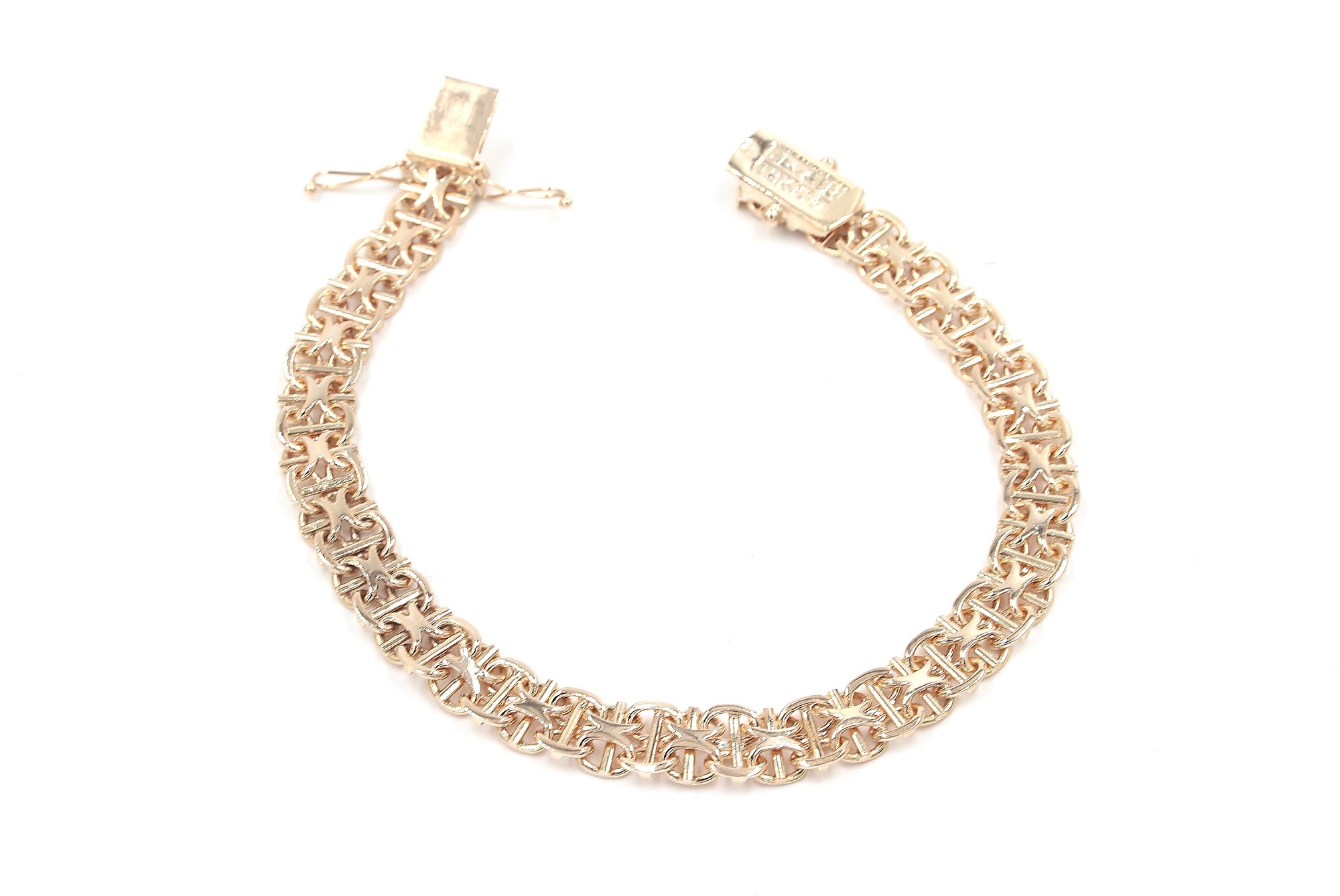 X-länk armband med stavar i 18k guld. vikt: 15,6g