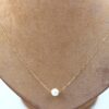 Halsband med pärla i 18k guld . vikt:1,35g