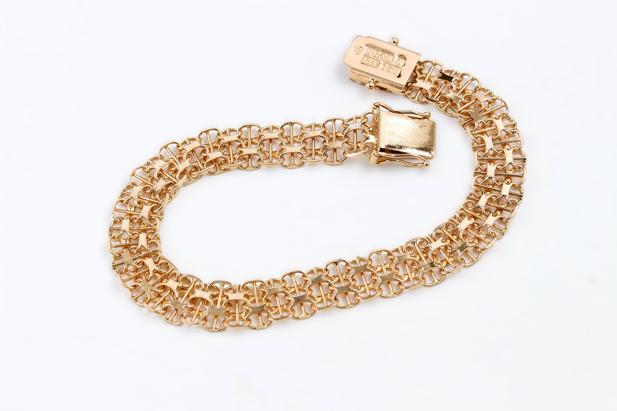 X-länk armband med stavar i 18k guld.Vikt 11.20g
