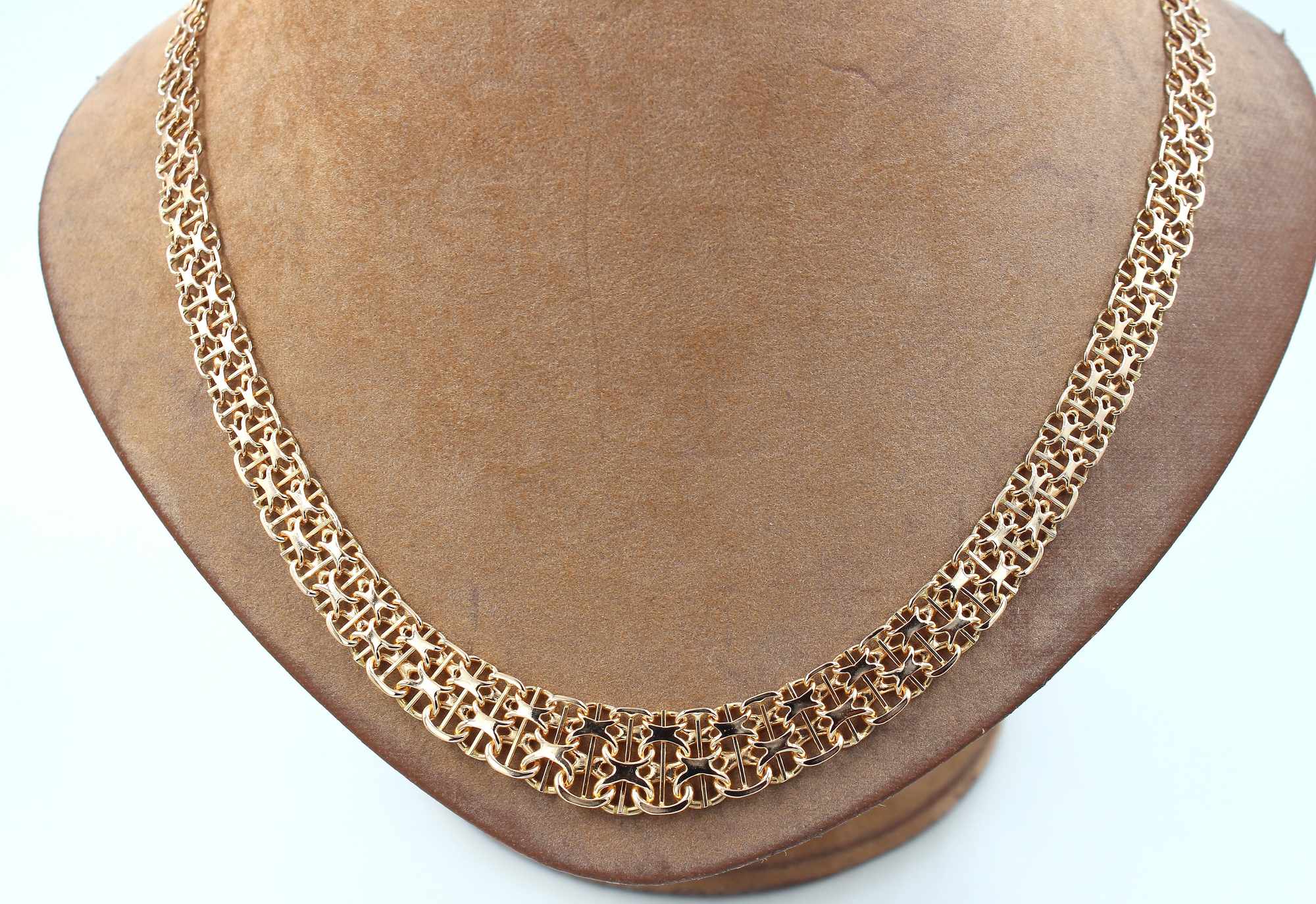 X-länk halsband med stavar i 18k guld. vikt: 26,35g